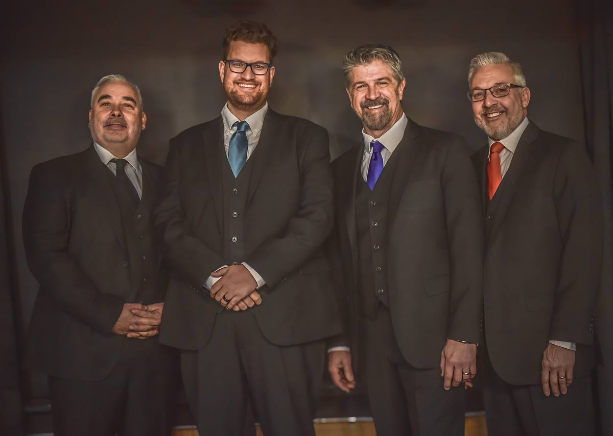 Neel, Joe, Bill, and Tony together in formal stagewear